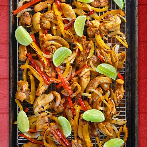 Sheet Pan Chicken Fajitas with Avocado Crema